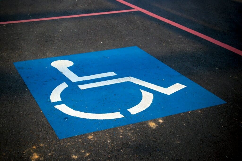Wheelchair-accessibility-symbol-on-a-road-surface